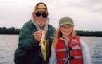 Ron Lindner, fishing with his granddaughter in 2009.