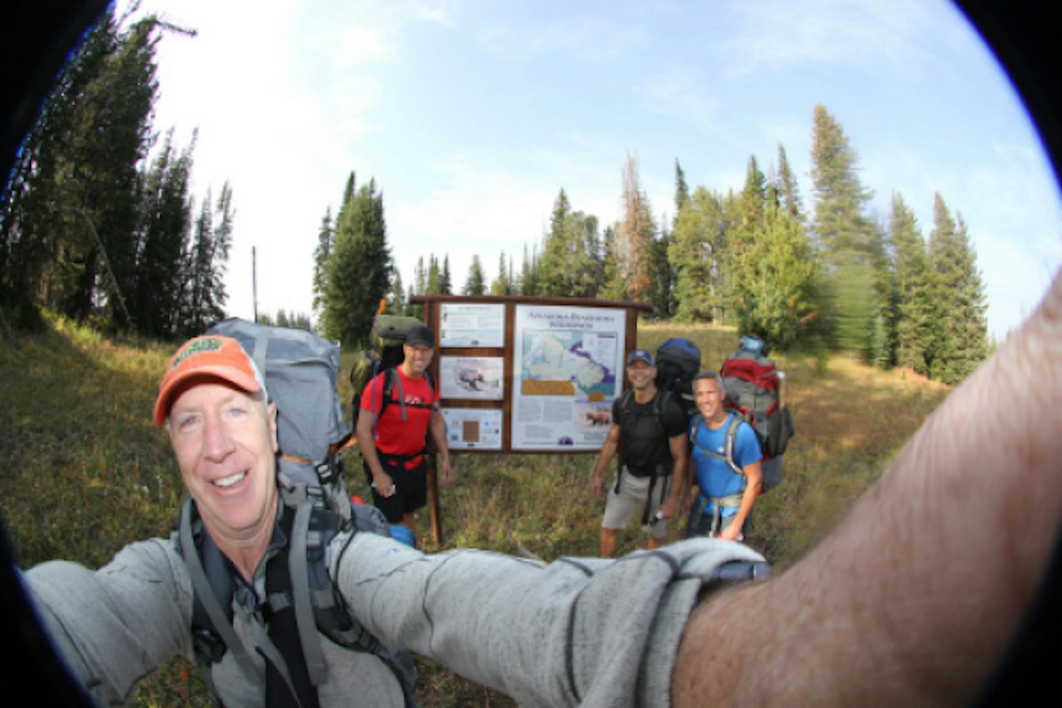 Friends, including Brad Johnson, far right, on the first day of their hike Sunday in the Beartooth Mountains. From left, Todd Green, Tom Therrien and Justin Reid.