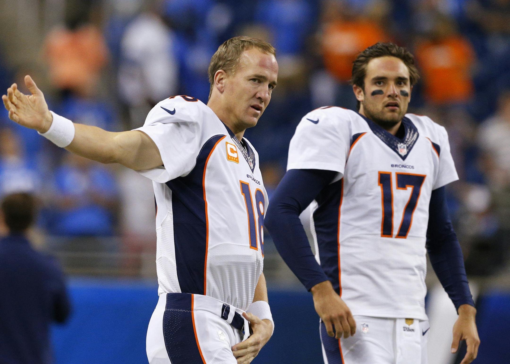 Denver Broncos quarterbacks Peyton Manning, left, and Brock Osweiler.