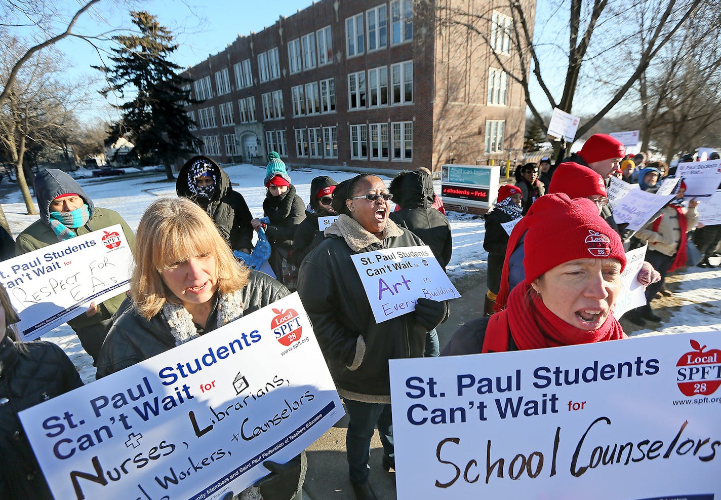 Yolanda Roth, center, yelled in support of teachers and parents as they gathered at the American Indian Magnet School for a rally, Wednesday, February 17, 2017 in St. Paul, MN. The St. Paul teachers union joined18 other locals across the nation Wednesday in hosting "walk in" events in support of neighborhood schools -- and its contract demand. ] (ELIZABETH FLORES/STAR TRIBUNE) ELIZABETH FLORES &#x2022; eflores@startribune.com