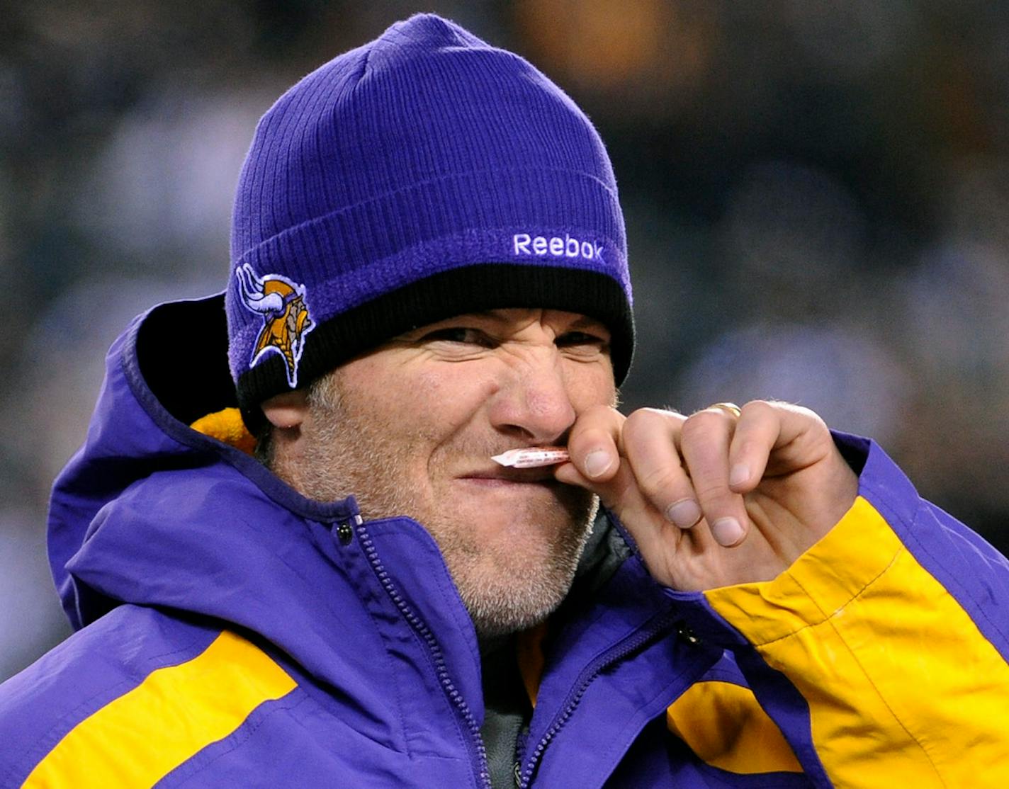 Minnesota Vikings injured quarterback Brett Favre takes a whiff of smelling salts on the sidelines during the Vikings' NFL football game against the Philadelphia Eagles, Tuesday, Dec. 28, 2010, in Philadelphia. (AP Photo/Miles Kennedy)