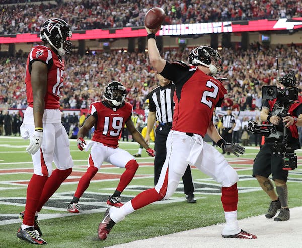 Falcons quarterback Matt Ryan spiked the ball after scoring on a quarterback keeper against the Packers in the NFC Championship Game on Sunday.