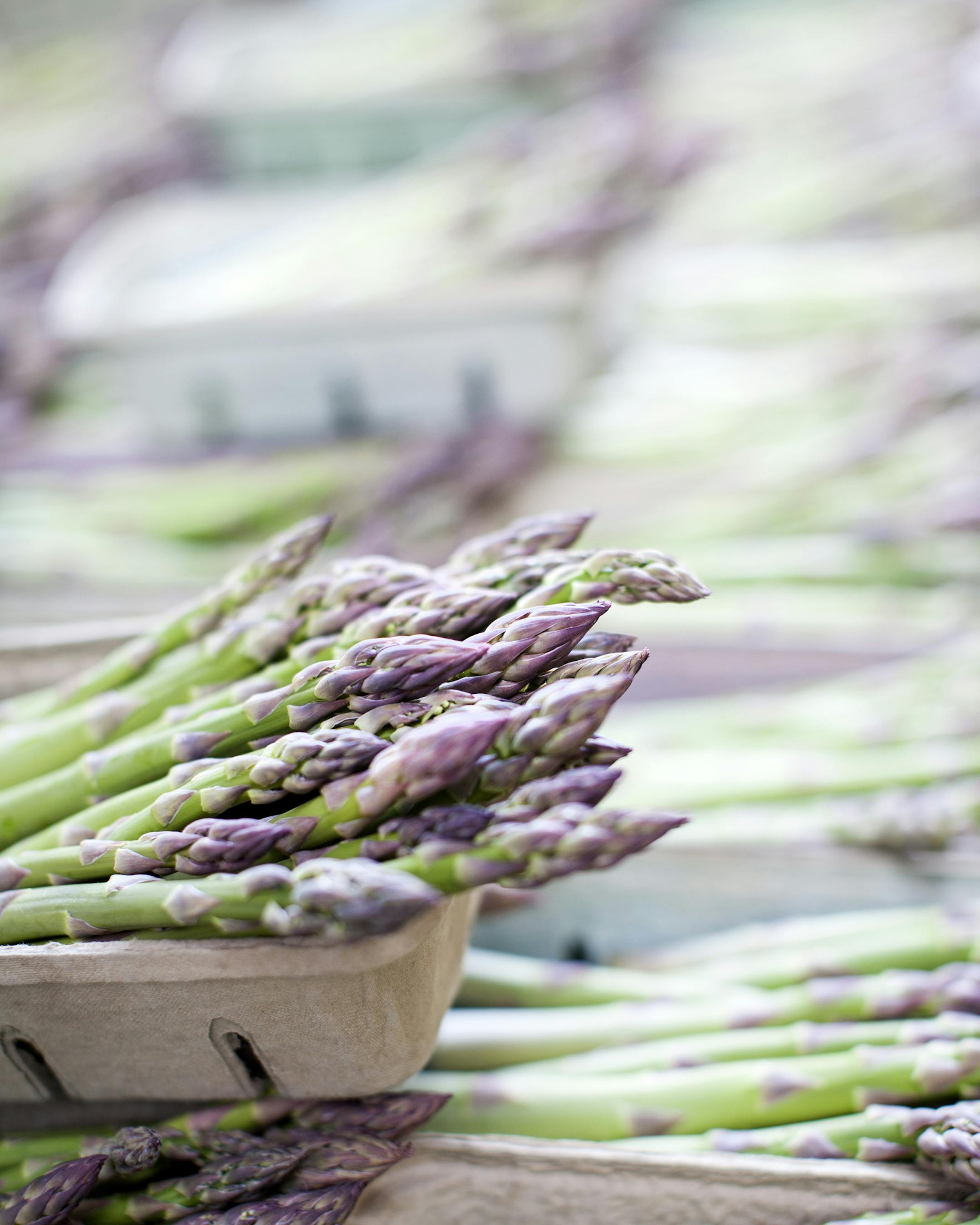 Asparagus from Produce Acres in Cold Spring sits in baskets for sale at the Minneapolis Farmers Market.