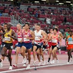 Competitors run in the men’s 10,000-meters final at the 2020 Summer Olympics.
