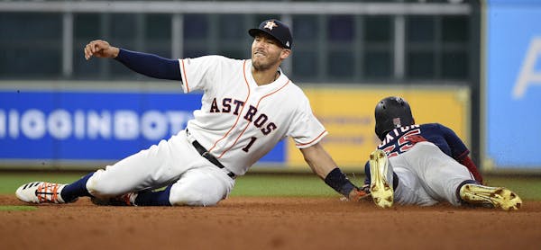In a rare feat, Astros shortstop Carlos Correa tagged out Byron Buxton on a steal attempt in the eighth.