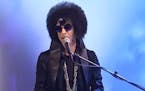 A screen shot of Prince's 2014 "Saturday Night Live" performance when Chris Rock was the host.