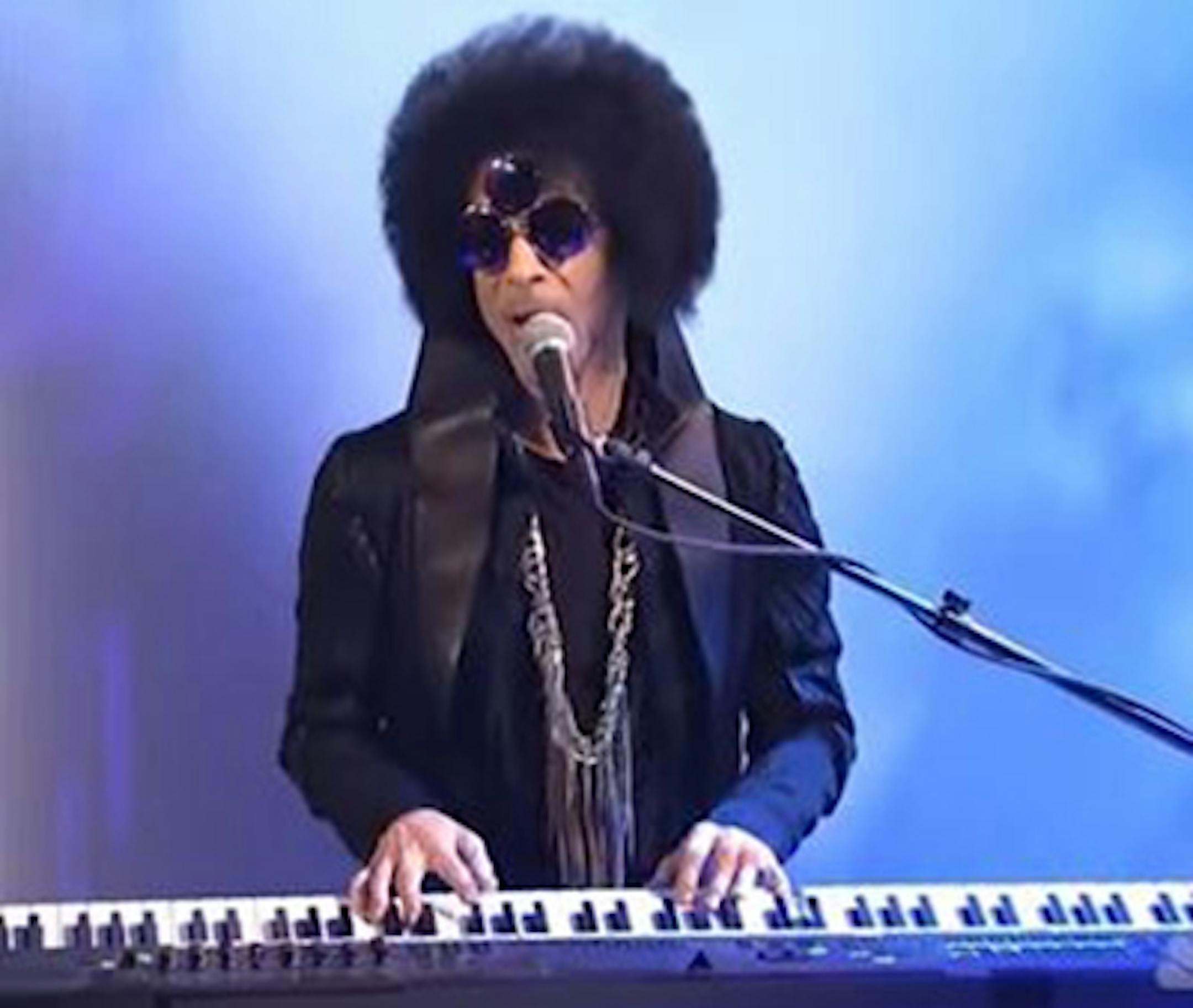 A screen shot of Prince's 2014 "Saturday Night Live" performance when Chris Rock was the host.