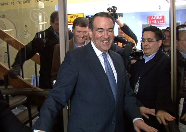 Mike Huckabee, Republican presidential candidate left the Cornerstone Family Church after morning prayer service.