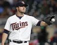 Minnesota Twins starting pitcher Phil Hughes (45) reacts after giving up a two run homer to Cleveland Indians second baseman Jose Ramirez (11) in the 