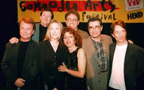 FILE - Former cast members of SCTV, from left, Dave Thomas, Joe Flaherty, Catherine O'Hara, Andrea Martin, foreground, Harold Ramis, Eugene Levy and M