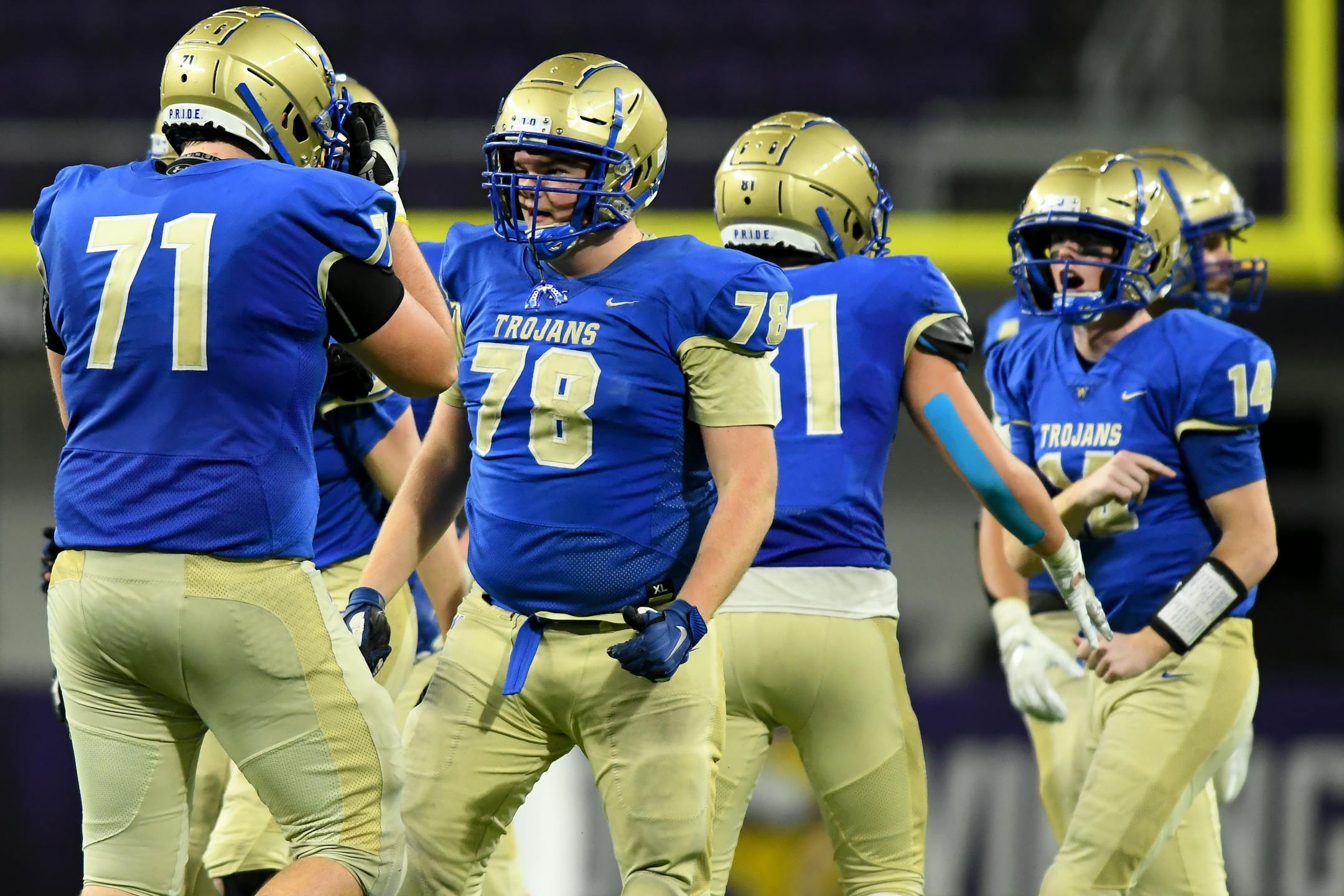 Wayzata offensive linemen Jac Carver (71) and Joe Salonek (78) celebrated as it became apparent the team would clinch the Class 6A title. (Aaron Lavinsky/Star Tribune)