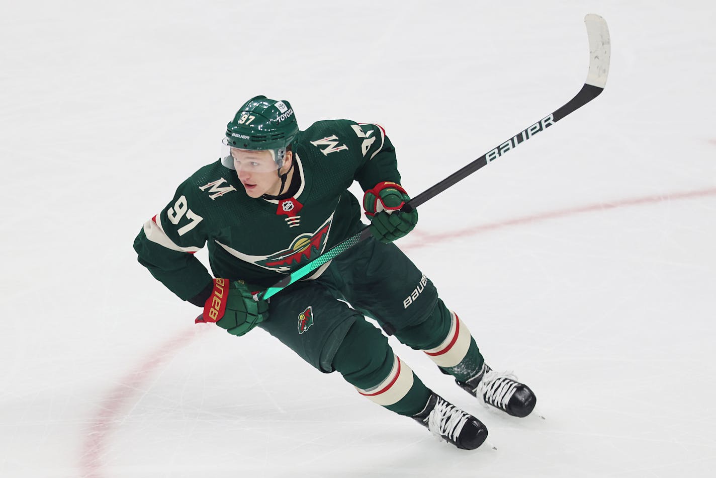 Minnesota Wild's Kirill Kaprizov (97) skates during the first period of an NHL hockey game against the New York Islanders, Sunday, Nov. 7, 2021, in St. Paul, Minn. Minnesota won 5-2. (AP Photo/Stacy Bengs)