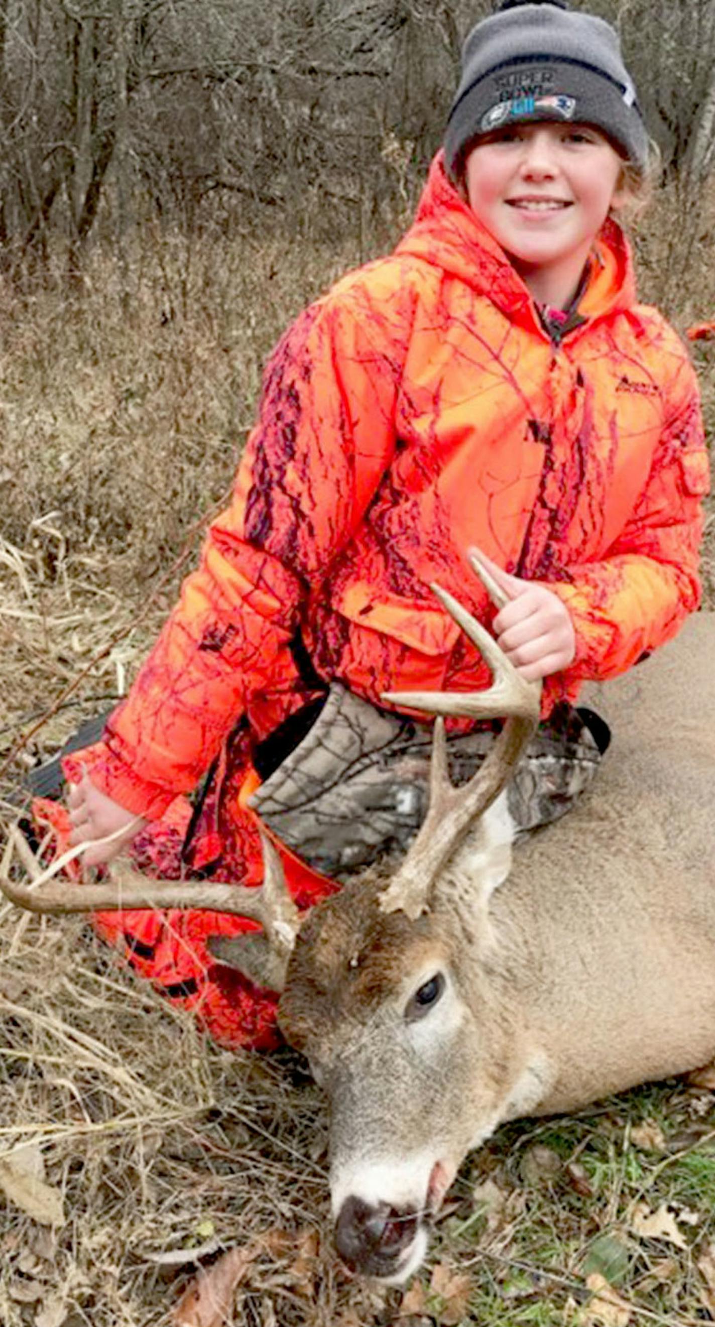 Cora Rushmeyer, 10, of Albany, harvested her first deer, an 8-point buck, while hunting with her mother, Angie, on the family farm near Long Prairie.