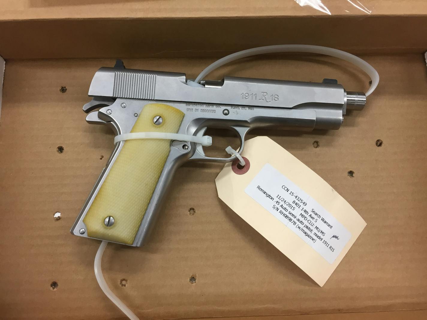 The handgun Allen "Lance" Scarsella used to shoot five protesters Nov. 23, 2015. Scarsella was convicted of felony assault and riot.