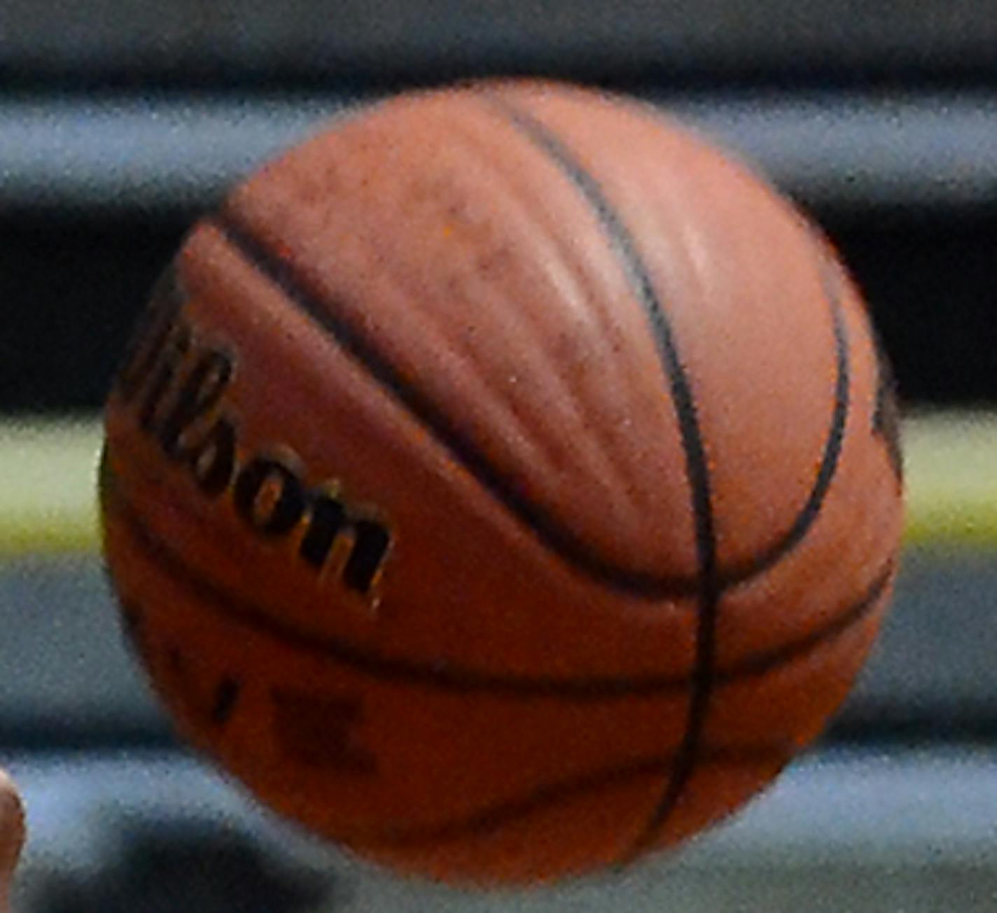 In this photo taken on Tuesday, Jan. 13, 2015, T.W. Andrews' Jamiya Jackson (32) reaches for a rebound between Dudley's Porschia Witherspoon (21) and Lena Barghen (23) during a high school basketball game in High Point, N.C. (AP Photo/The Enterprise, Michael Lindsay)