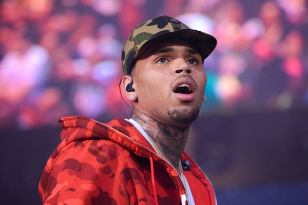 FILE - In this June 7, 2015 file photo, rapper Chris Brown performs at the 2015 Hot 97 Summer Jam at MetLife Stadium in East Rutherford, N.J.
