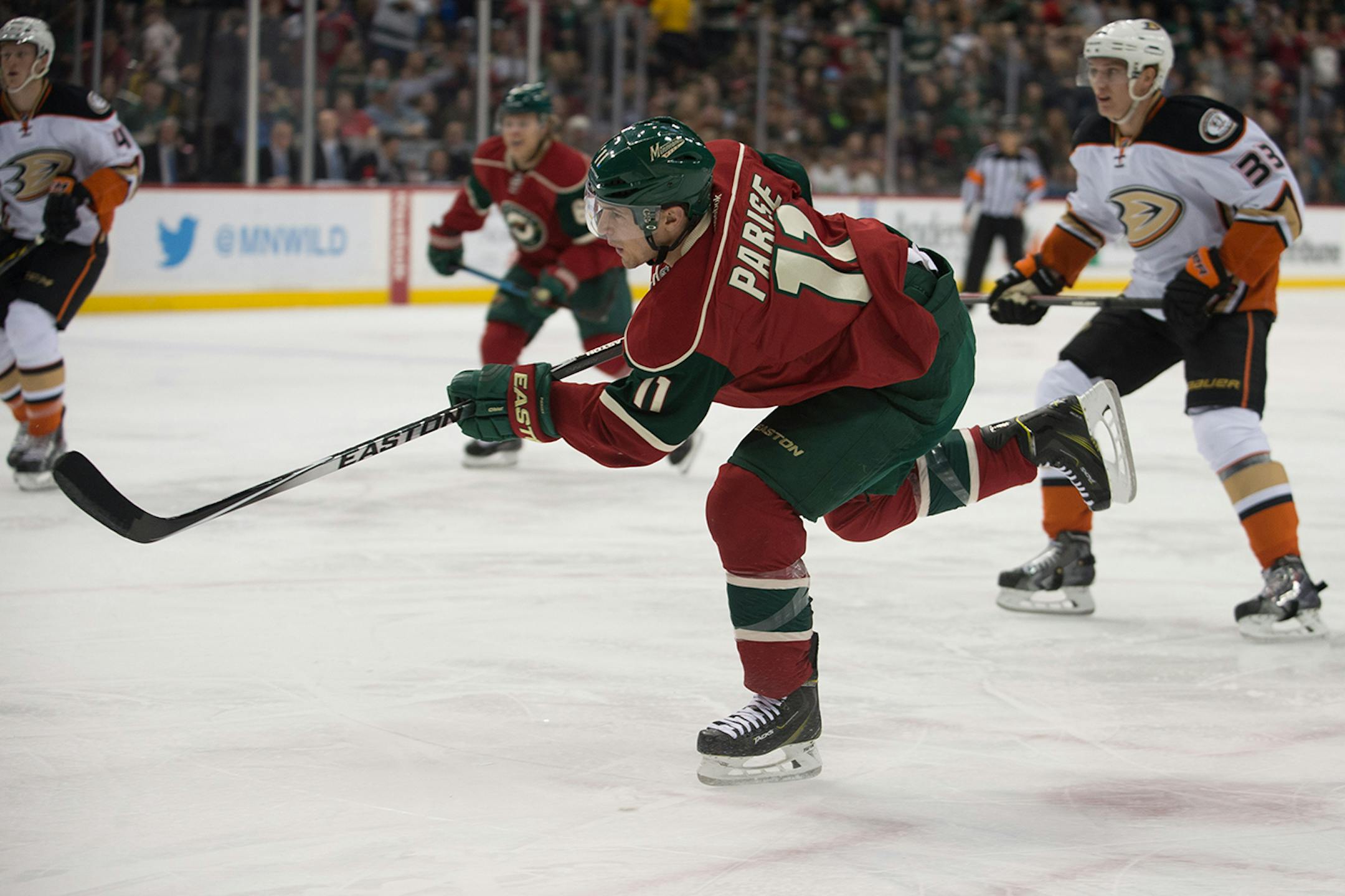 Minnesota Wild left wing Zach Parise (11) attempts a shot on the Anaheim Ducks during the second period. ] AARON LAVINSKY • aaron.lavinsky@startribune.com The Minnesota Wild take on the Anaheim Ducks Friday, Dec. 5, 2014 at Xcel Energy Center in St. Paul.