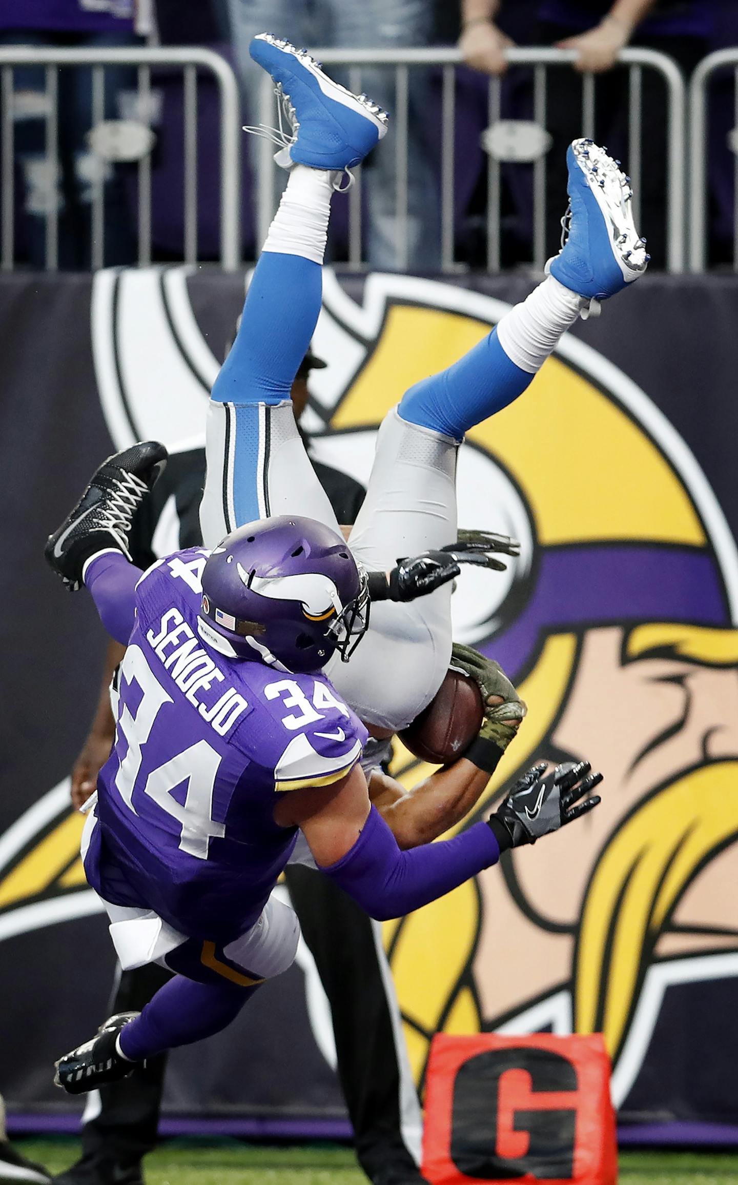 Andrew Sendejo (34) hit Golden Tate (15) as he leapt into the end zone to score the winning touchdown in overtime. Detroit beat Minnesota by a final score of 22-16. ] CARLOS GONZALEZ cgonzalez@startribune.com - November 6, 2016, Minneapolis, MN, US Bank Stadium, NFL, Minnesota Vikings vs. Detroit Lions