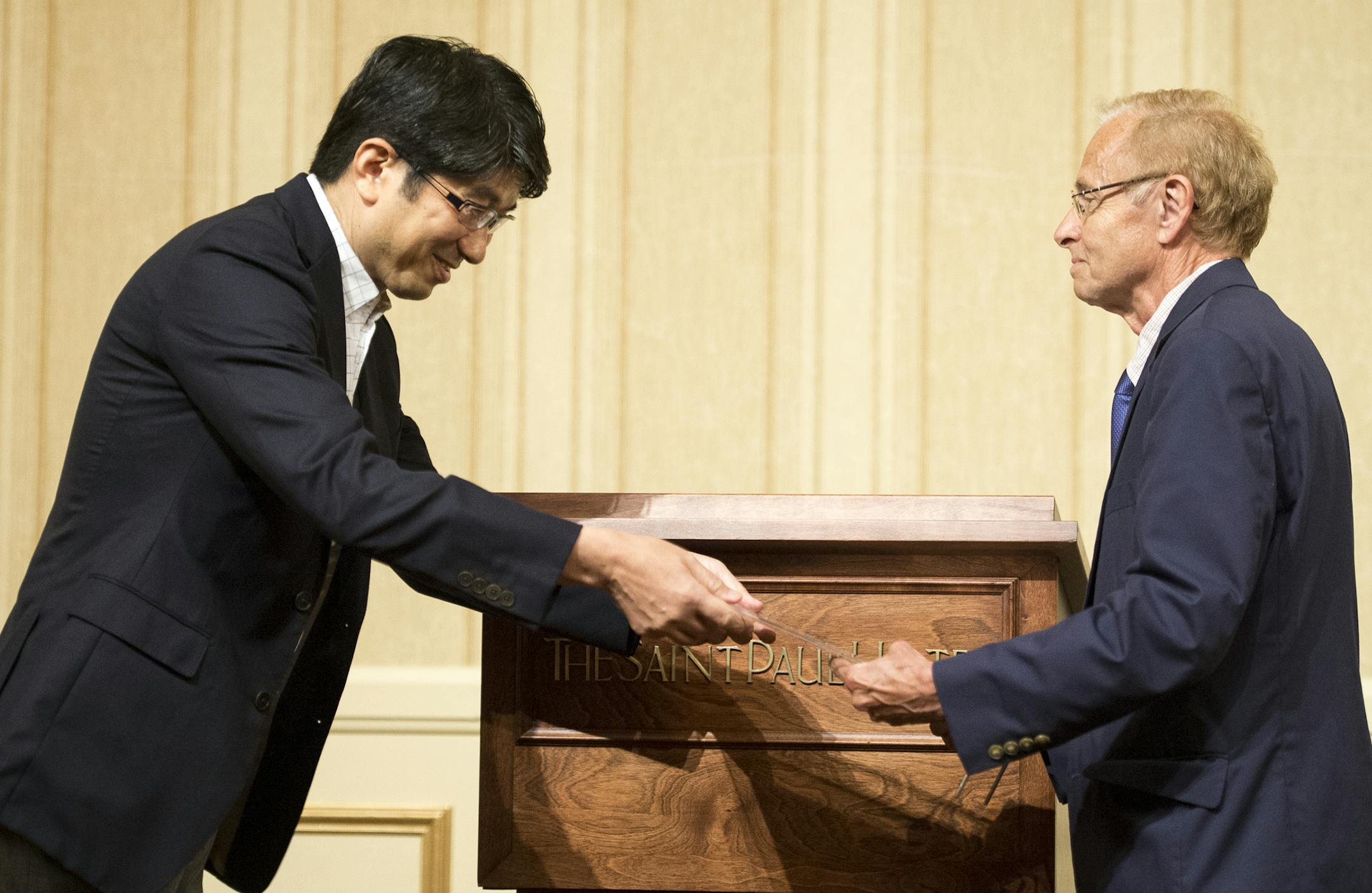 Nagasaki Mayor Tomihisa Taue handed former St. Paul Mayor Jim Scheibel the Nagasaki City Honorary Certificate of International Friendship and Peace during a ceremony Thursday night. ] Aaron Lavinsky • aaron.lavinsky@startribune.com Former St. Paul Mayor Jim Scheibel will be honored Thursday by the mayor and other dignitaries from Nagasaki, Japan, for his efforts to forge continued peace and goodwill between sister cities. Scheibel will be recognized for his work to get a Minnesota sculptu