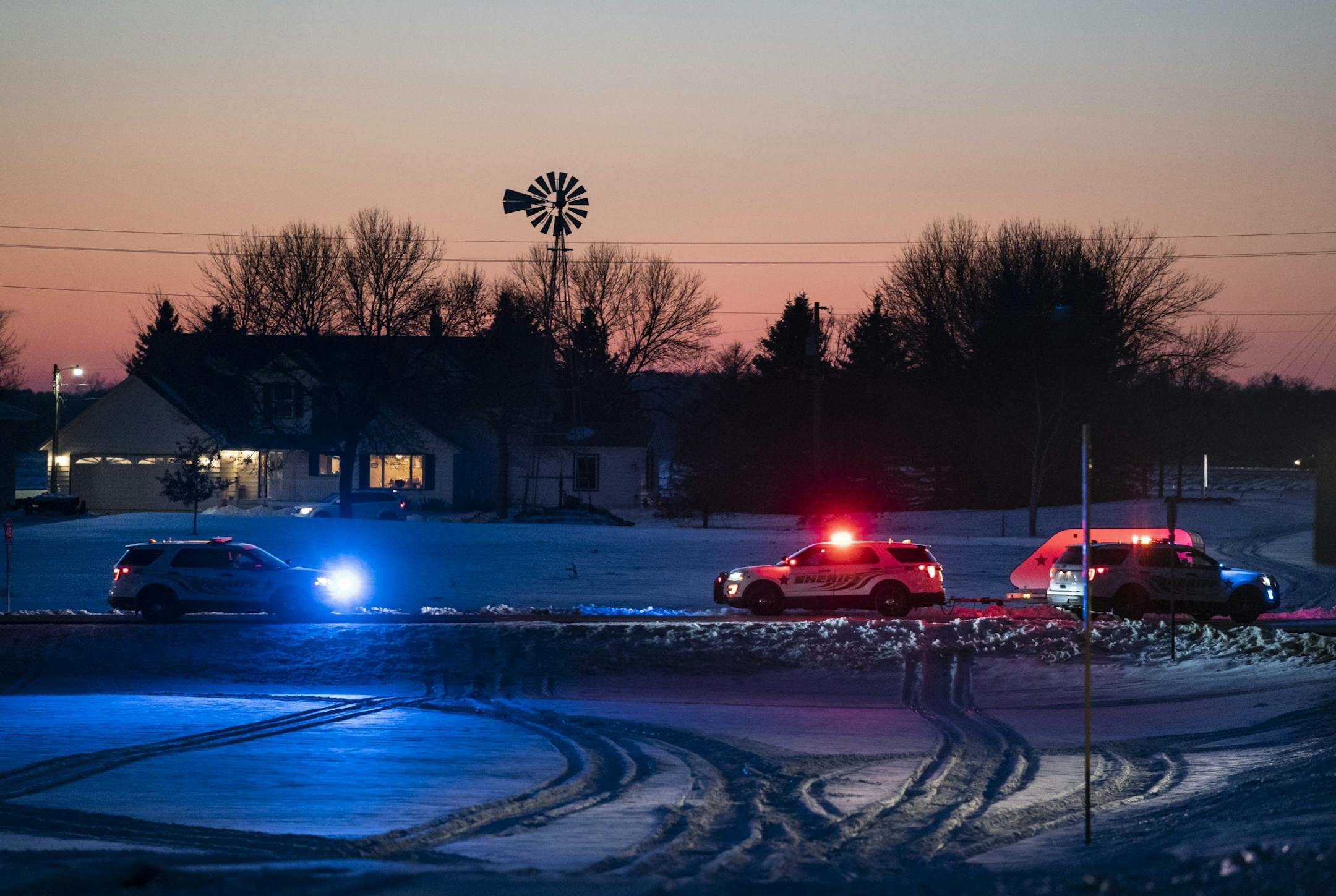 Police blocked off a road leading to the scene of a Black Hawk helicopter that crashed in the woods neat Marty, Minn., on Thursday.