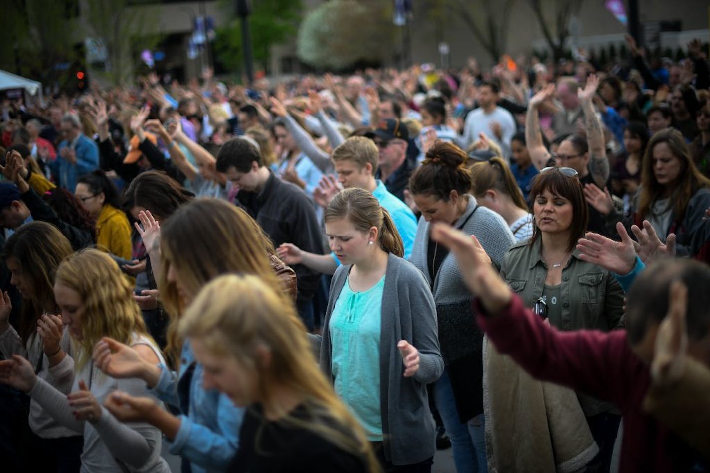 Lizzie Erickson, of Bloomington, center, participated in the National Day of Prayer outside U.S. Bank Stadium in 2016.