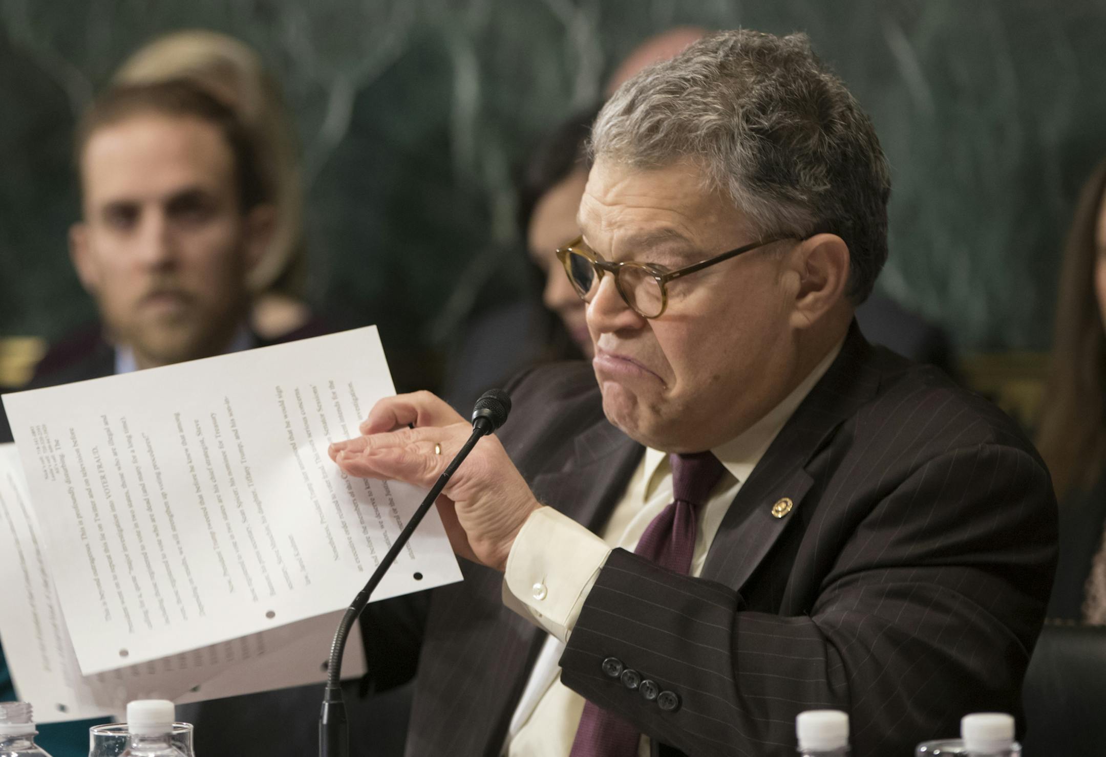Senate Judiciary Committee member Sen. Al Franken, D-Minn., right, joined by Sen. Amy Klobuchar, D-Minn., concludes his remarks on Capitol Hill in Washington, Wednesday, Feb. 1, 2017, before the committee voted to approve the nomination of Attorney General-designate Sen. Jeff Sessions, R-Ala., following angry exchanges between Republicans and Democrats. (AP Photo/J. Scott Applewhite)