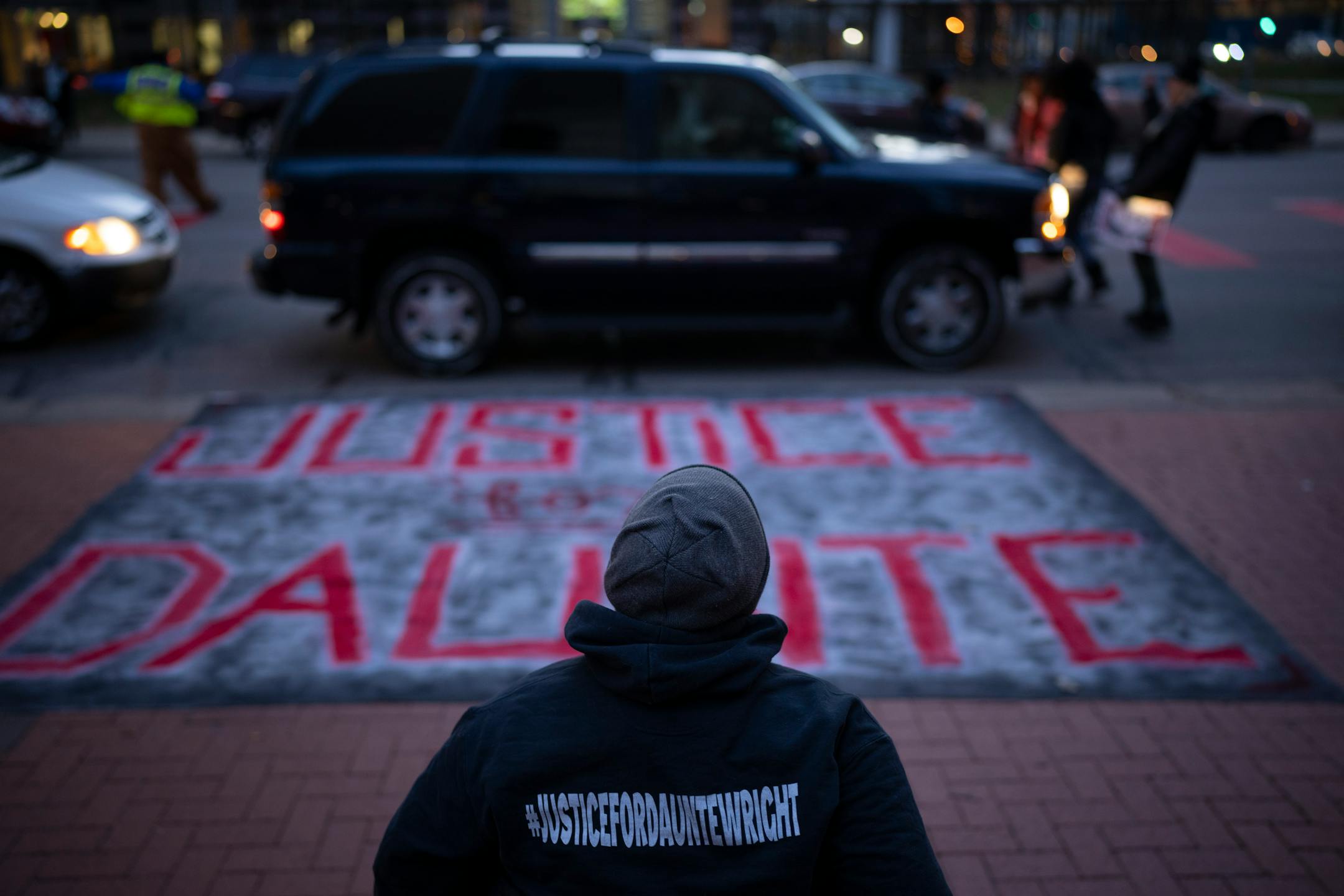 Demonstrators began to gather for a rally and a march on the street Tuesday, Nov. 30, 2021 outside the Hennepin County Government Center, where the trial of former police officer Kimberly Potter began in Minneapolis. A demonstration of support for the family of Daunte Wright by 75 or so people took place Tuesday, Nov. 30, 2021 outside the Hennepin County Government Center followed by a short march in Minneapolis. ] JEFF WHEELER • Jeff.Wheeler@startribune.com