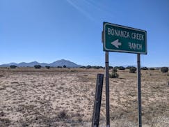 A sign points to the Bonanza Creek Ranch in Santa Fe, New Mexico, on Friday, Oct. 22, 2021.