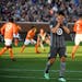 Minnesota United forward Christian Ramirez (21) reacted after suffering an apparent injury in the first half against the Houston Dynamo. ] AARON LAVIN