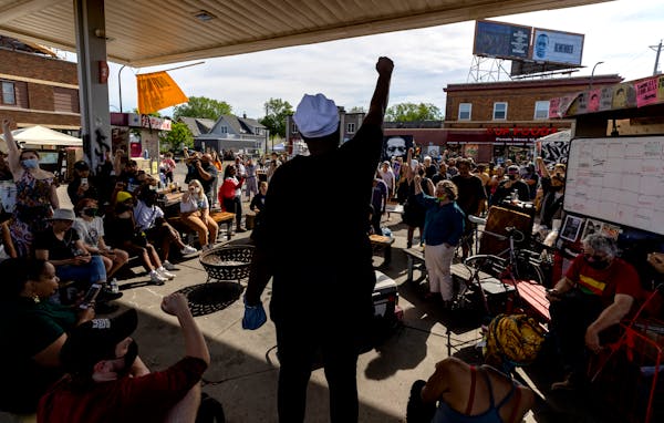 A crowd gathered Thursday afternoon near the gas station at George Floyd Square in south Minneapolis.