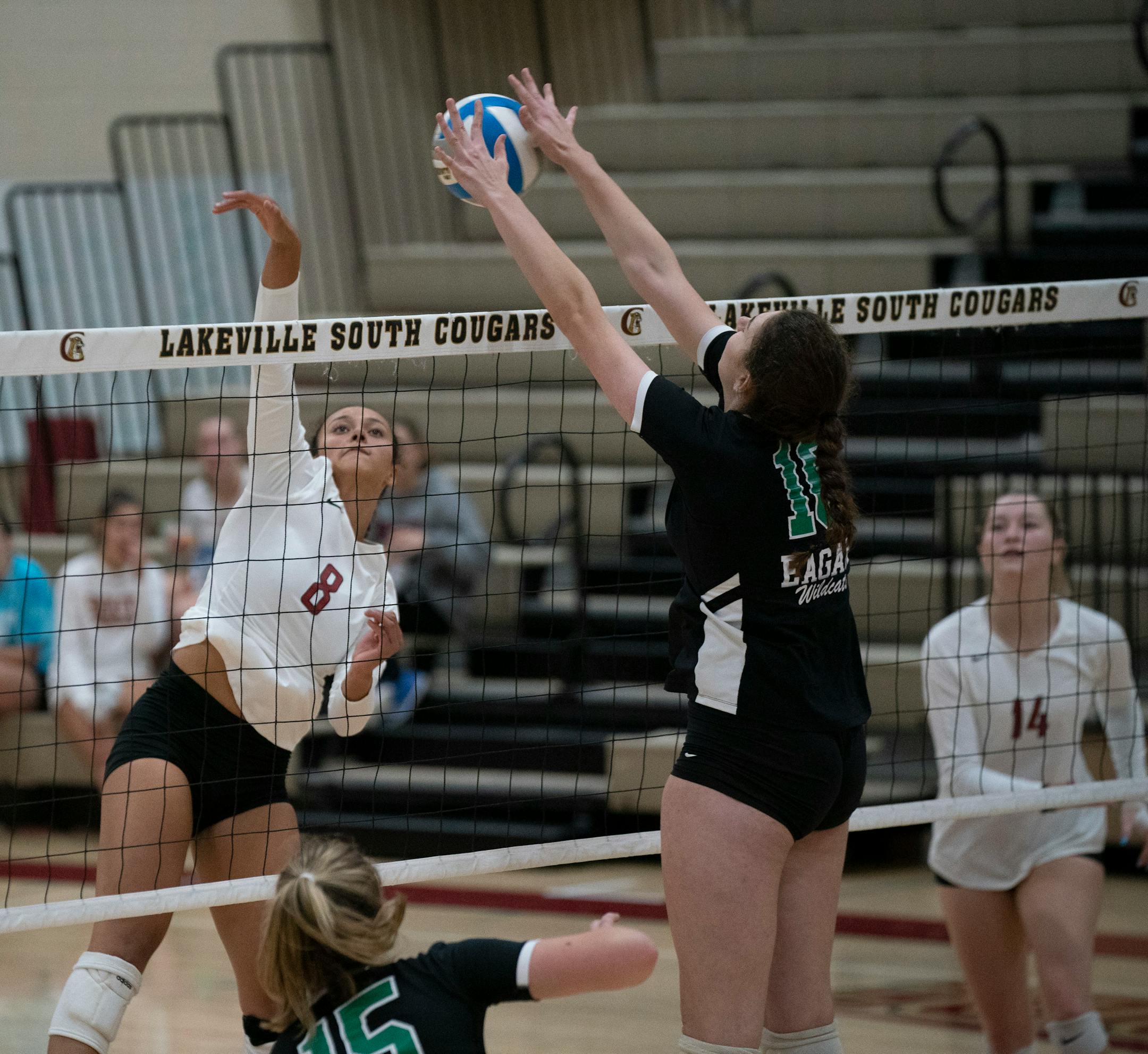Eagan's Kendall Kemp (16) blocked a shot by Lakeville South's Kendyl Storlie (8) in a match on Sept. 26 at Lakeville South. Photo: JEFF WHEELER • jeff.wheeler@startribune.com The kill shot and the block by some of the best players in the metro when Eagan defeated Lakeville South Thursday night, September 26, 2019, at Lakeville South High School.