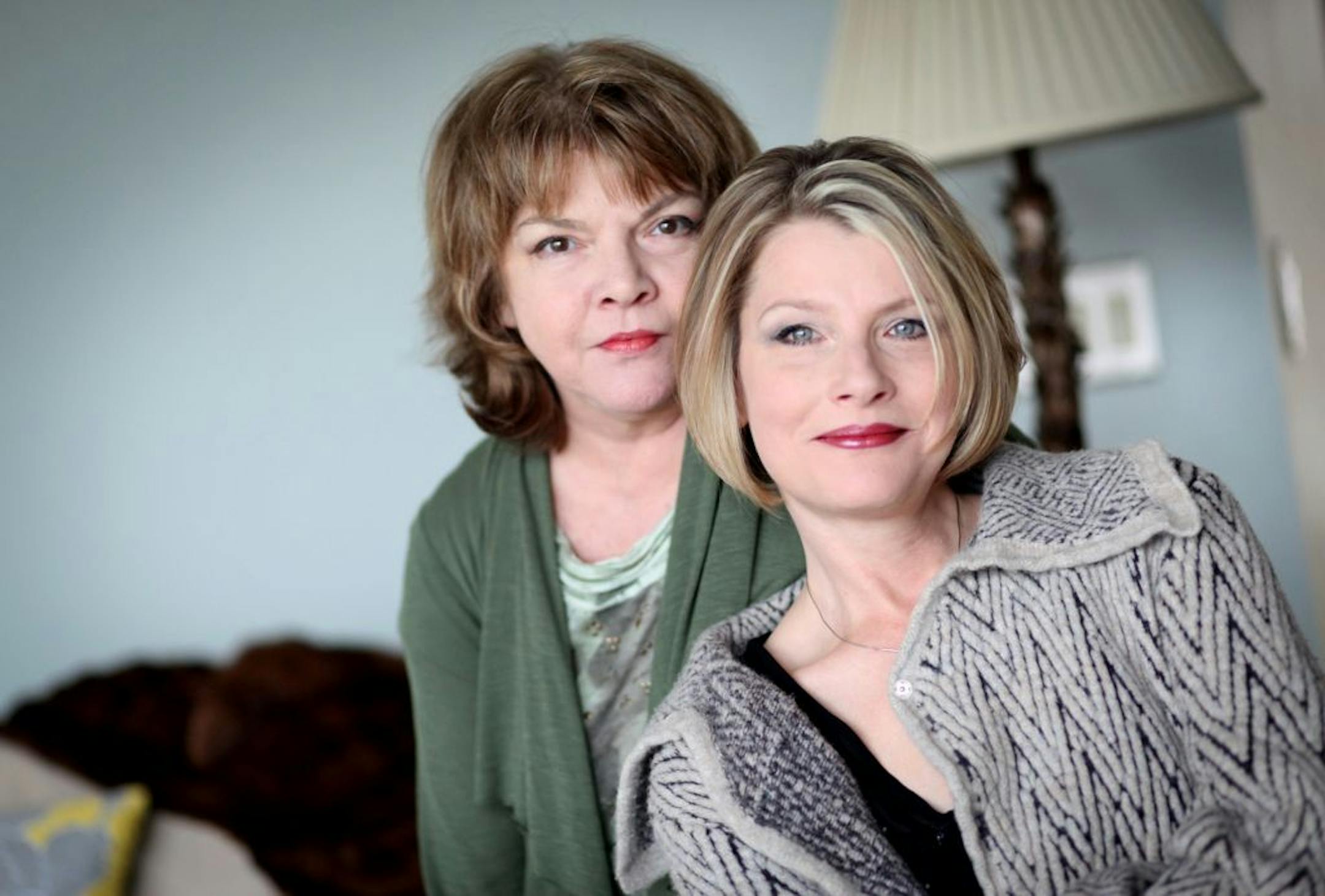 Mystery writers P.J. Lambrecht and her daughter Traci Lambrecht pose for a picture in Traci's Marine on St. Croix home recently.