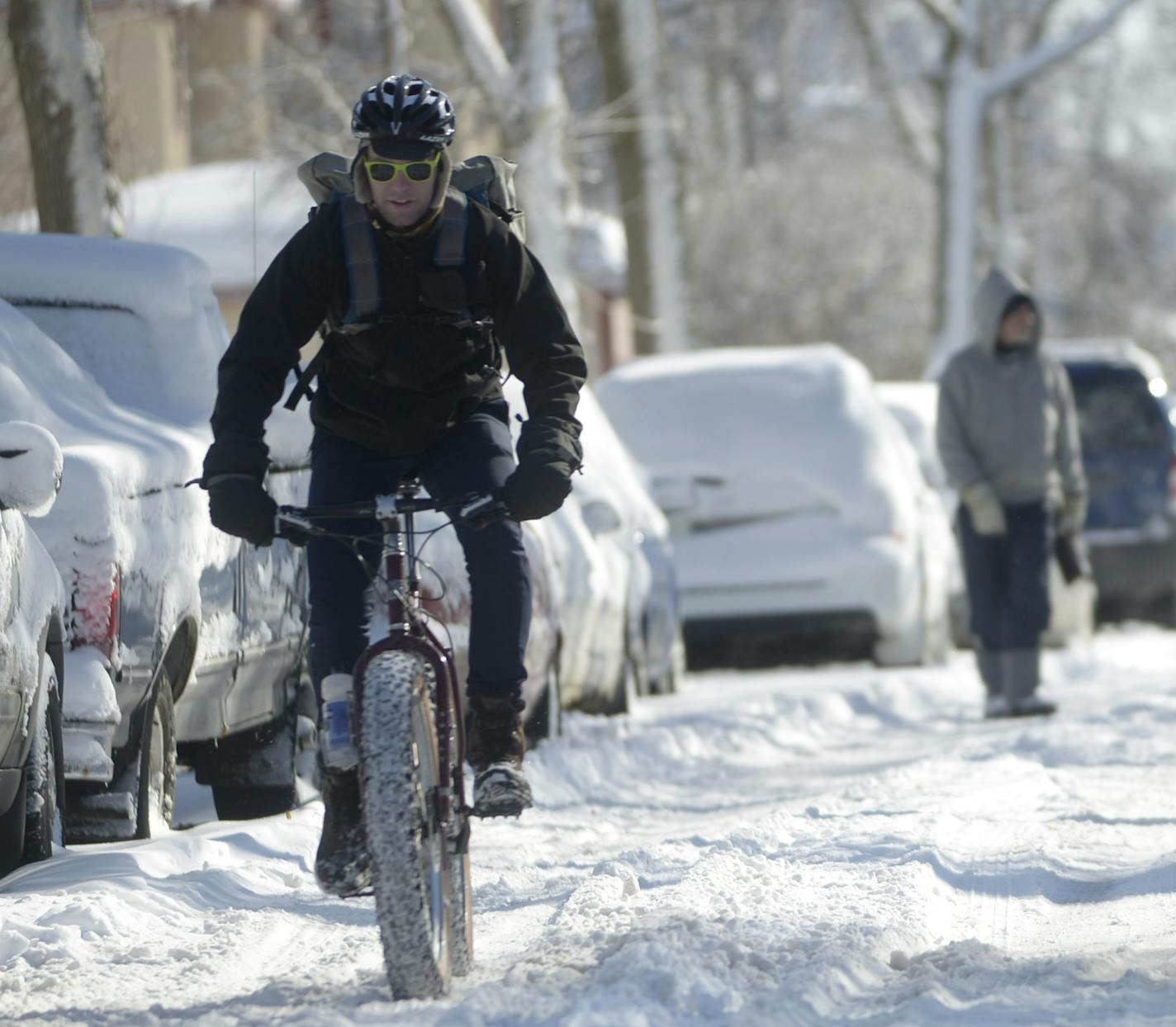 Chris Graham is an avid winter biker and co-owner of Rock-It bike courier service in Minneapolis. Graham rarely suspends delivery services, except this winter when there were several days when biking was dangerous. ] (AMANDA SNYDER/ Special to the Star Tribune)