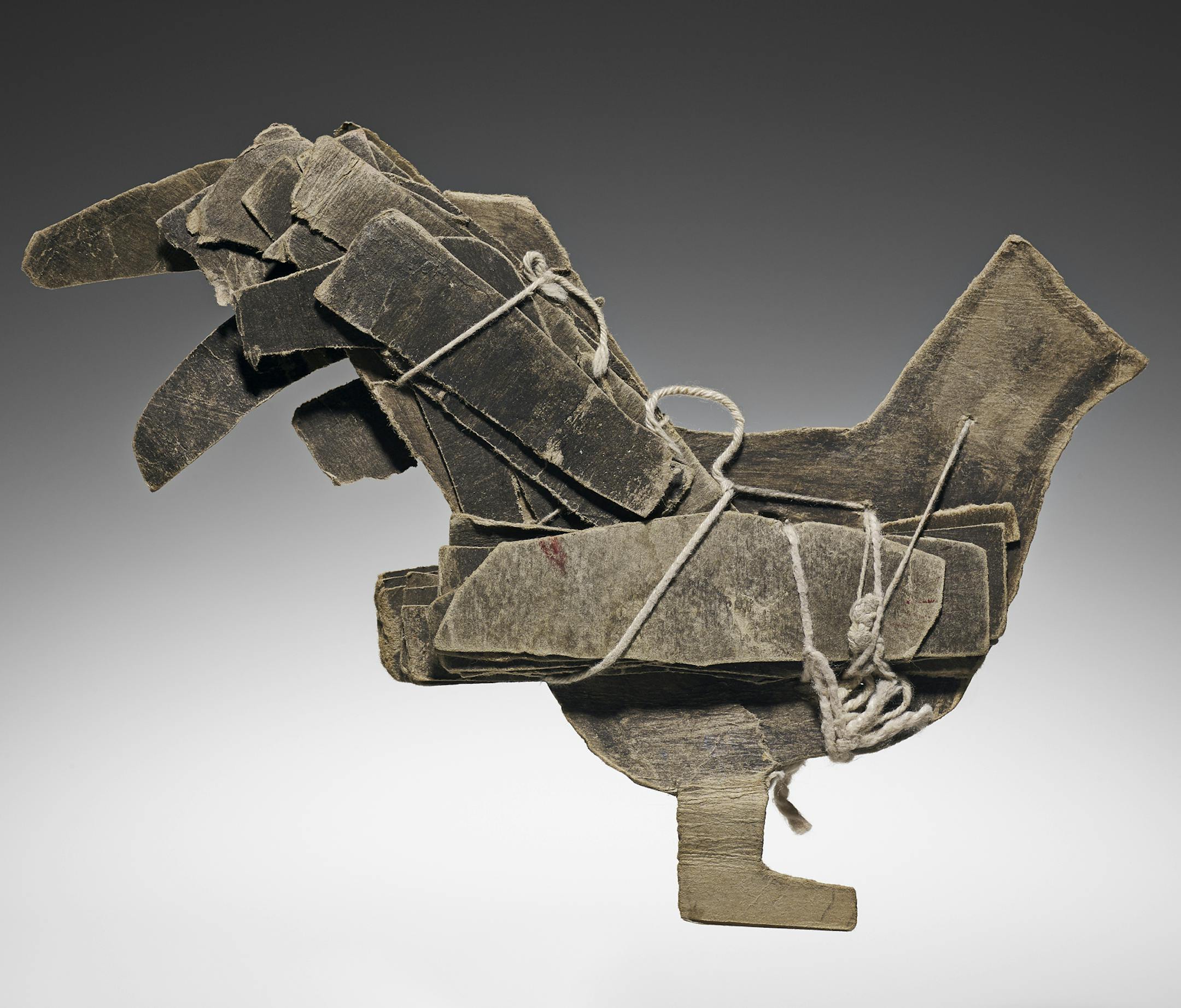 Minneapolis Institute of Art James Castle American, 1899ñ1977 "Untitled (Gray bird), not dated " Torn and cut paper and cardboard; sewn and tied with white cotton string; soot, soot wash, gray wash, and traces of red pigment 7-7/8 x 11 x 1 in. (20 x 27.9 x 2.5 cm) Private collection, Minneapolis