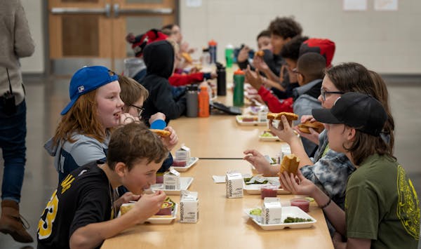 Fifth-graders ate school lunch at Champlin-Brooklyn Park Academy on Friday, Feb. 17, 2023, in Champlin.