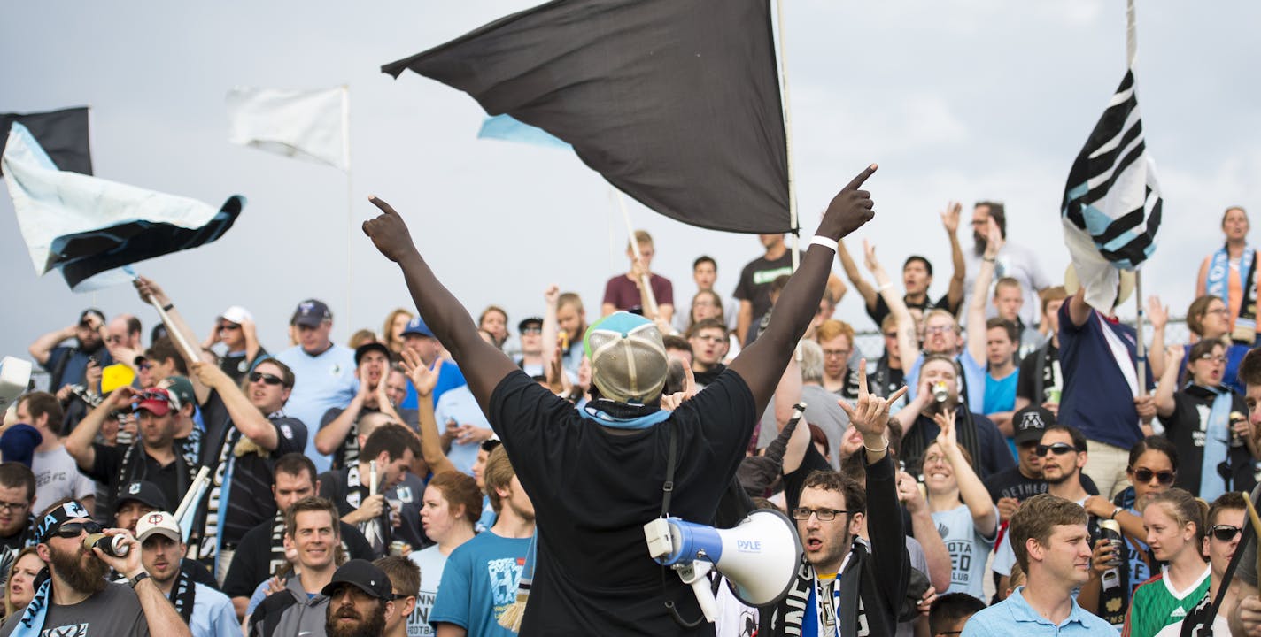 The Dark Clouds, led here by Abraham Opoti, &#x201c;bring the numbers,&#x201d; says True North Elite co-founder Nicolas Bisbee, &#x201c;but we bring the noise,&#x201d; so describing the complementary fan groups.