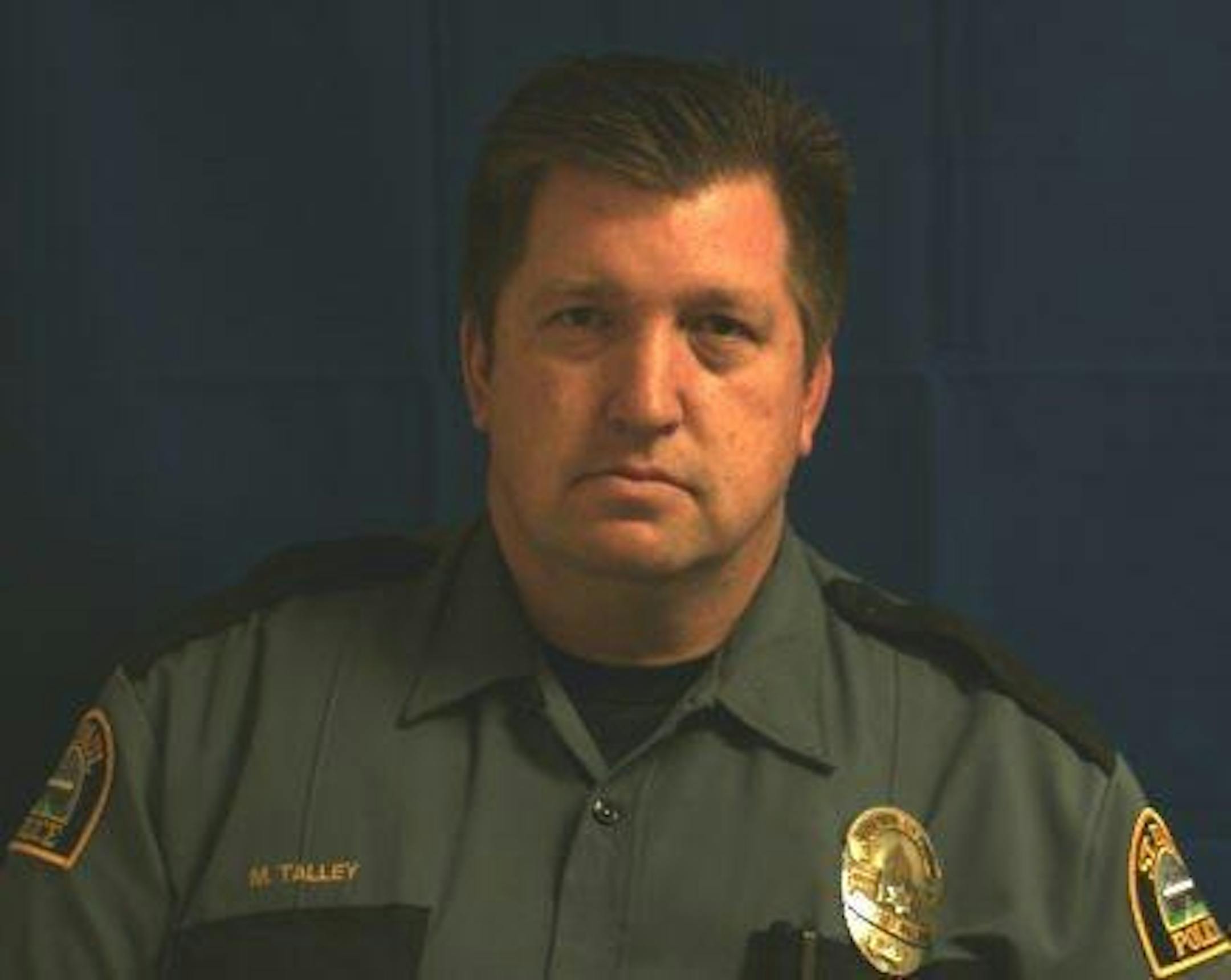 An apparently suicidal man allegedly shot St. Paul police officer Michael Talley in the face with an air rifle durnig a standoff Friday.