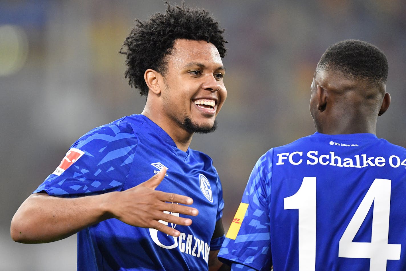 Schalke's Weston McKennie, left, celebrates with Schalke's Rabbi Matondo after scoring his side's opening goal during the German Bundesliga soccer match between Fortuna Duesseldorf and FC Schalke 04 in Duesseldorf, Germany, Wednesday, May 27, 2020. The nine-time defending Serie A champion McKennie has become the first American player at Juventus, confirmed late Saturday, August, 30, 2020. (AP Photo/Martin Meissner, Pool, File)