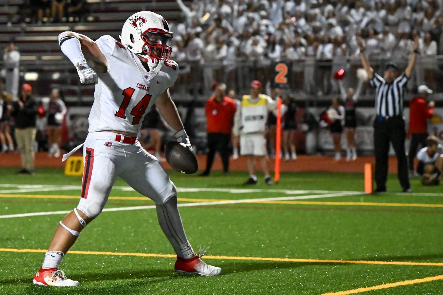 Centennial's Marcus Whiting (14) celebrates a touchdown in the second half against Maple Grove Thursday, Sept. 14, 2023 at Maple Grove High School in Maple Grove, Minn. . ] AARON LAVINSKY • aaron.lavinsky@startribune.com