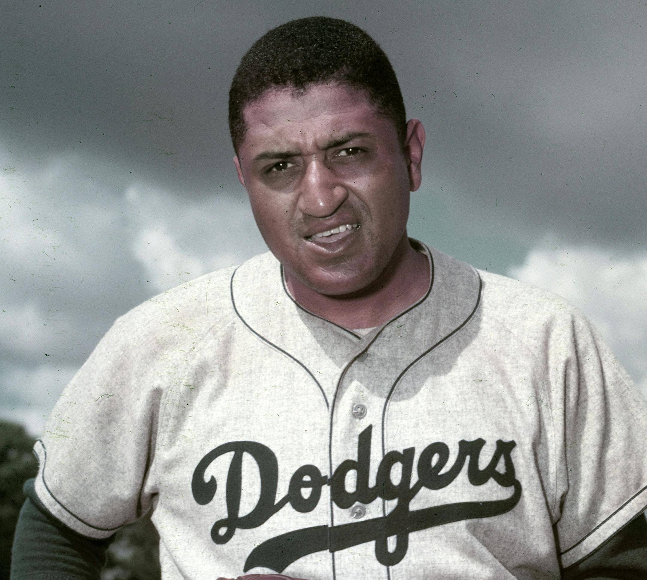 FILE - This is a March 1956 file photo showing Brooklyn Dodgers' Don Newcombe. Newcombe, the hard-throwing Brooklyn Dodgers pitcher who was one of the first black players in the major leagues and who went on to win the rookie of the year, Most Valuable Player and Cy Young awards, has died. He was 92. The team confirmed that Newcombe died Tuesday morning, Feb. 19, 2019, after a lengthy illness. (AP Photo)