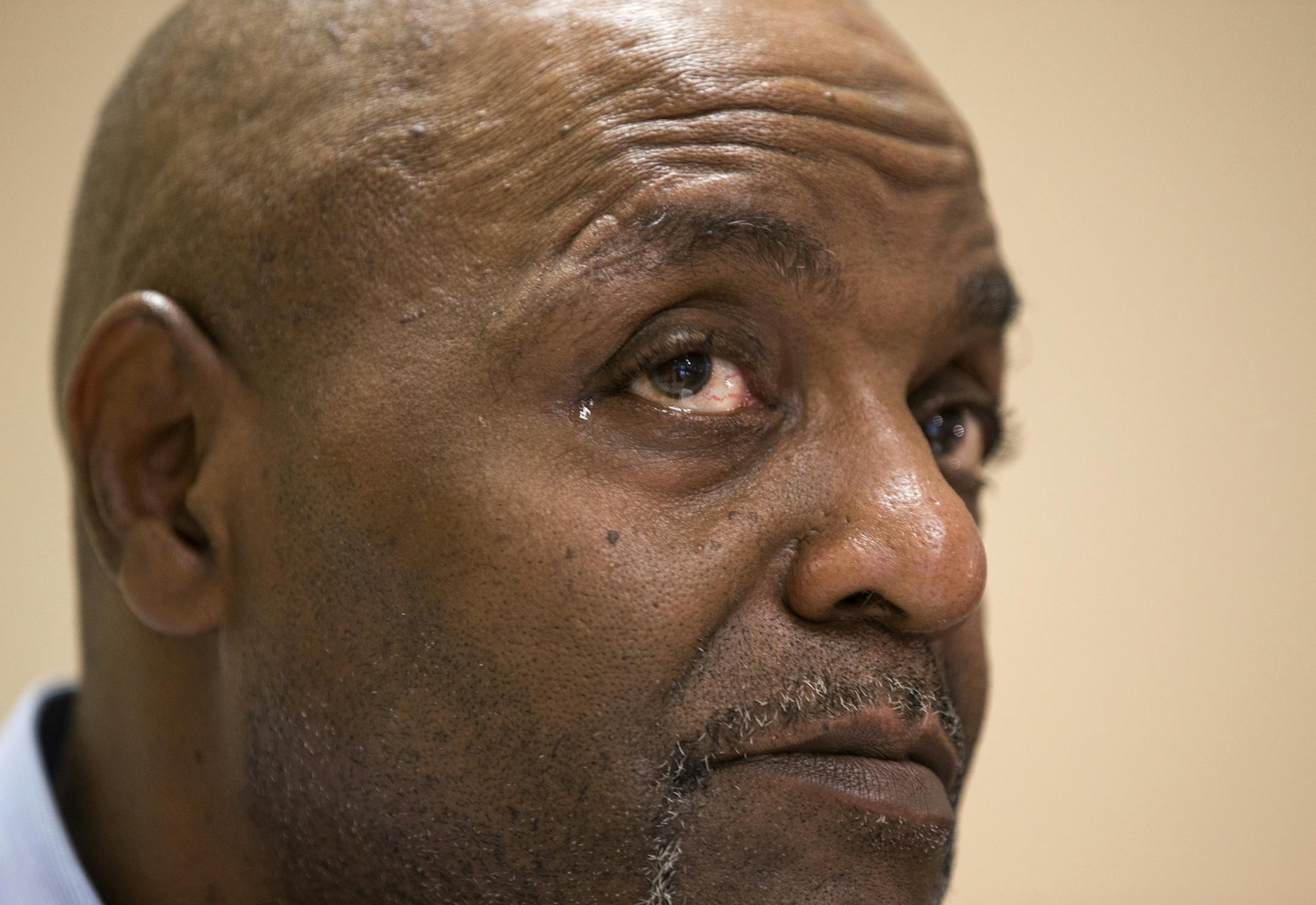 Al Flowers, who suffered injuries during an arrest by Minneapolis Police officers last year, speaks during a press conference at the Minneapolis Urban League building in Minneapolis on Thursday, July 16, 2015. ] LEILA NAVIDI leila.navidi@startribune.com / BACKGROUND INFORMATION: Community leaders met with the public and media calling for an overhaul of the Office of Police Conduct Review's response to civilian complaints.