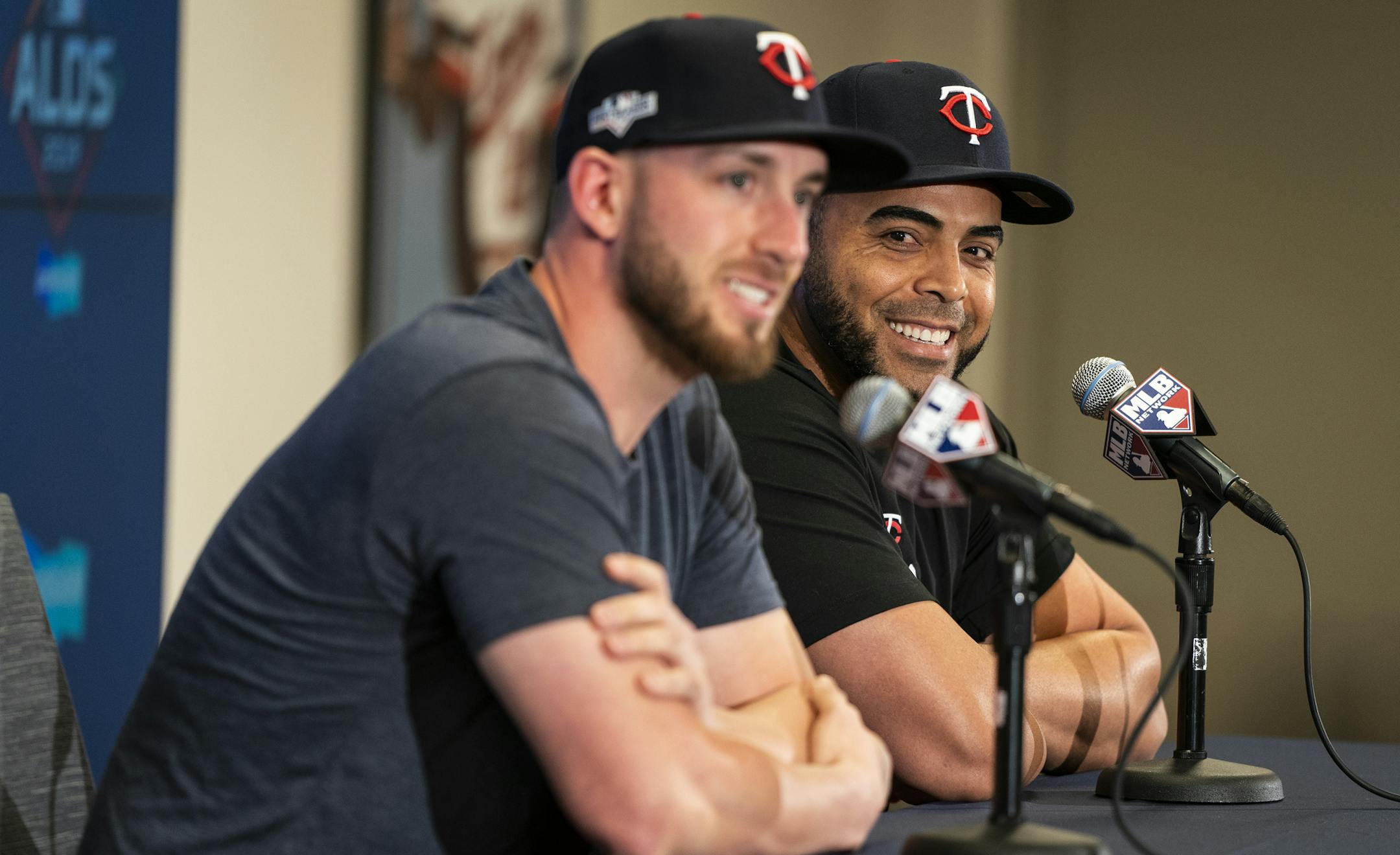 Twins players Mitch Garver, left, and Nelson Cruz speak to the media during a press conference. ] LEILA NAVIDI • leila.navidi@startribune.com BACKGROUND INFORMATION: Twins press conference at Target Field in Minneapolis on Tuesday, October 1, 2019.