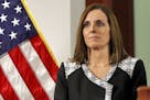 FILE - In this Dec. 18, 2018 file photo, then Rep. Martha McSally, R-Ariz., waits to speak during a news conference at the Capitol in Phoenix. Sen. Ma