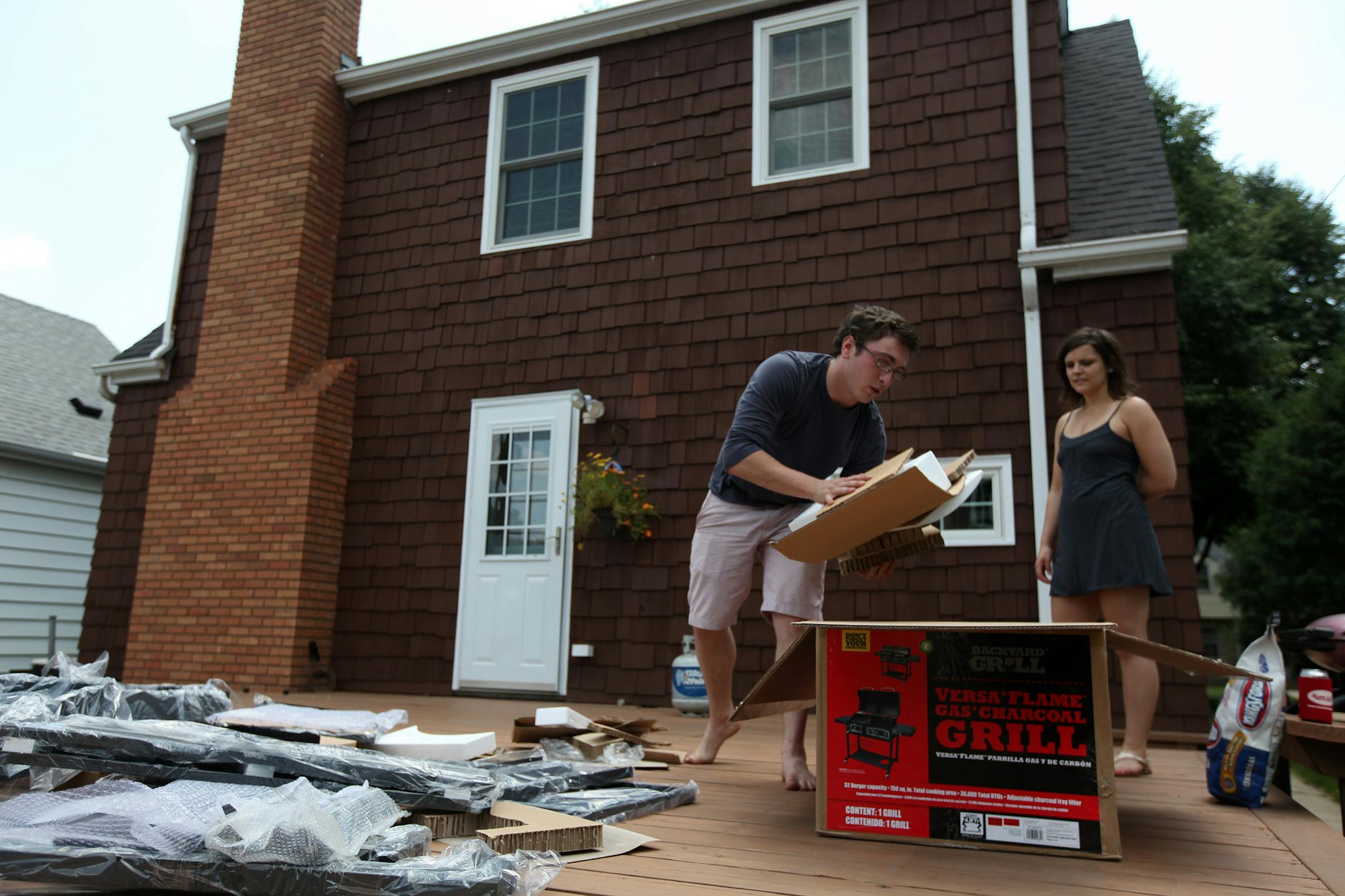 Adam and Elspeth Weis just bought their first home in St. Paul, the couple spent Sunday June 10, 2012 getting things in order at the place in St. Paul, MN.] (Jerry Holt/ STAR TRIBUNE/