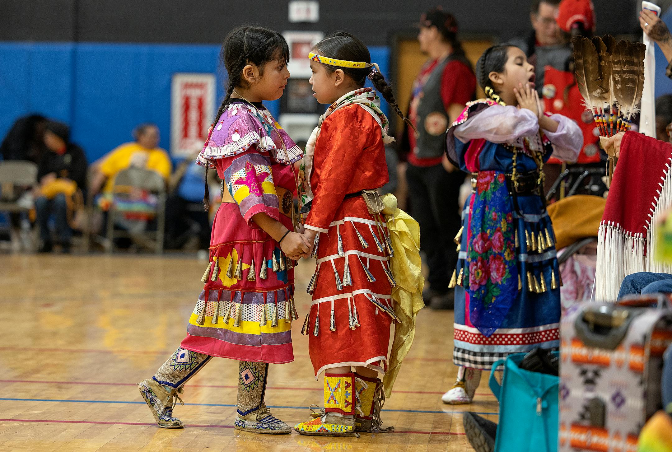Young girls participate in a Pow Wow to honor the 50th Anniversary of the AIM Warriors of Wounded Knee of 1973 in Rapid City, SD.