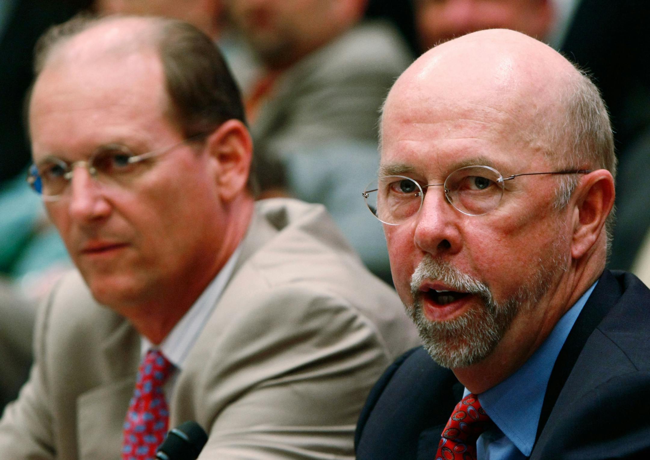 Delta CEO Richard Anderson, left, and Northwest CEO Doug Steenland appear before the House Transportation and Infrastructure Committee Wednesday in Washington, DC.