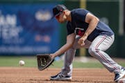 Alex Kirilloff fielded a ground ball in spring training. The first baseman made his 2023 debut with the Twins on Saturday.
