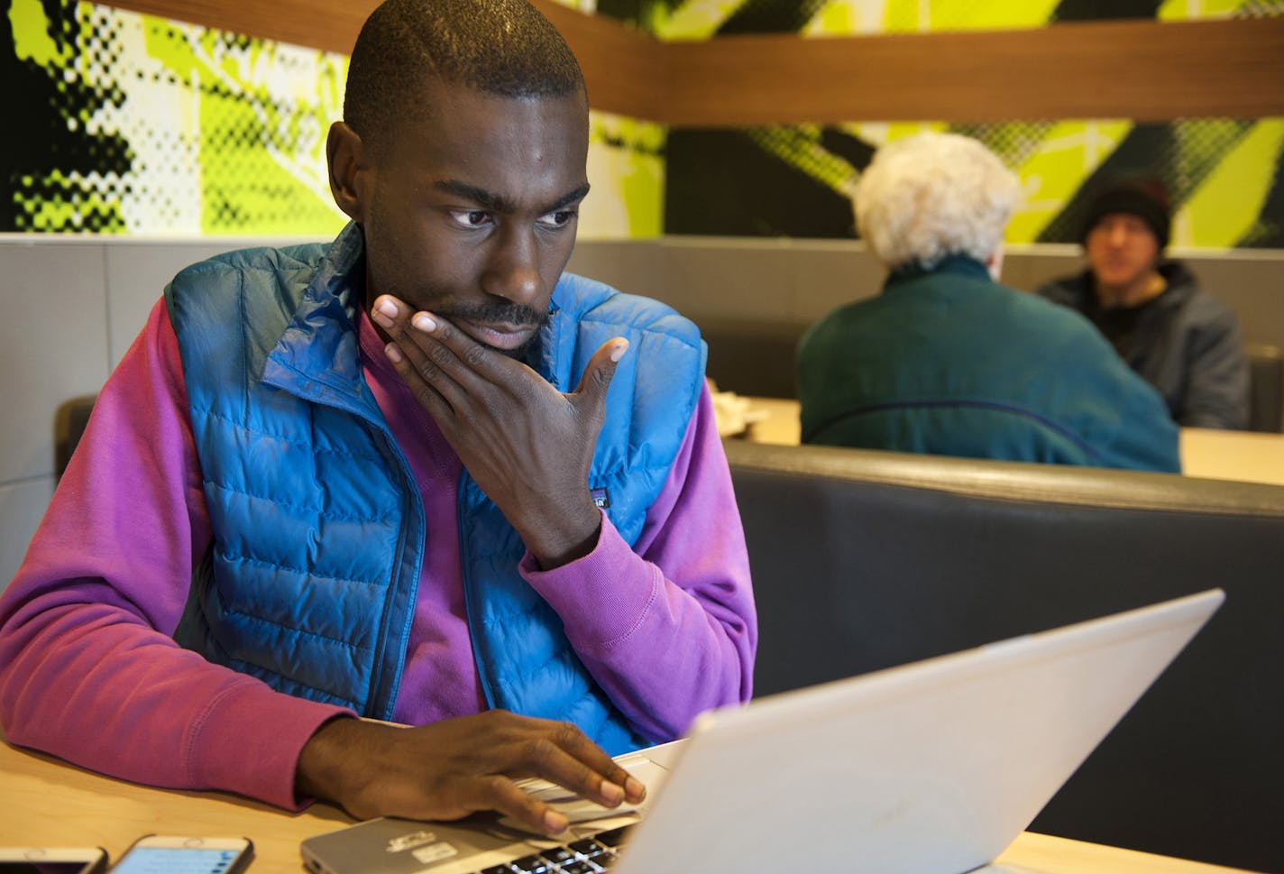 DeRay Mckesson, an activist who helps operate the newsletter and website Words To Action, updates the website and posts updates to Twitter from A McDonalds in Ferguson, Missouri. on Nov. 2. Illustrates FERGUSON (category a), by Sandhya Somashekhar &#xa9; 2014, The Washington Post. Moved Tuesday, Nov. 11, 2014. (MUST CREDIT: Photo for The Washington Post by Sid Hastings)