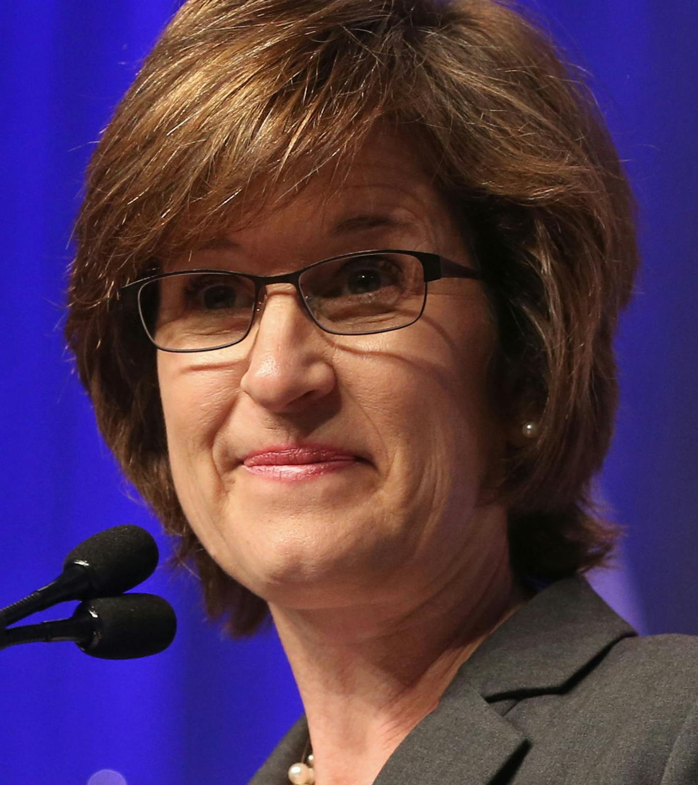 FILE - In this May 31, 2014 file photo State Auditor Rebecca Otto speaks in Duluth, Minn. Ott will face Matt Entenza, the former state legislator who has statewide campaign experience, in the Democratic primary. (AP Photo/Jim Mone, File)