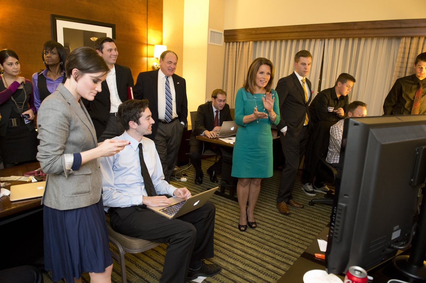 Michele Bachmann watched election results Tuesday night with Republican supporters at the Hilton Minneapolis-Bloomington. The tight contest wasn't decided until Wednesday morning.